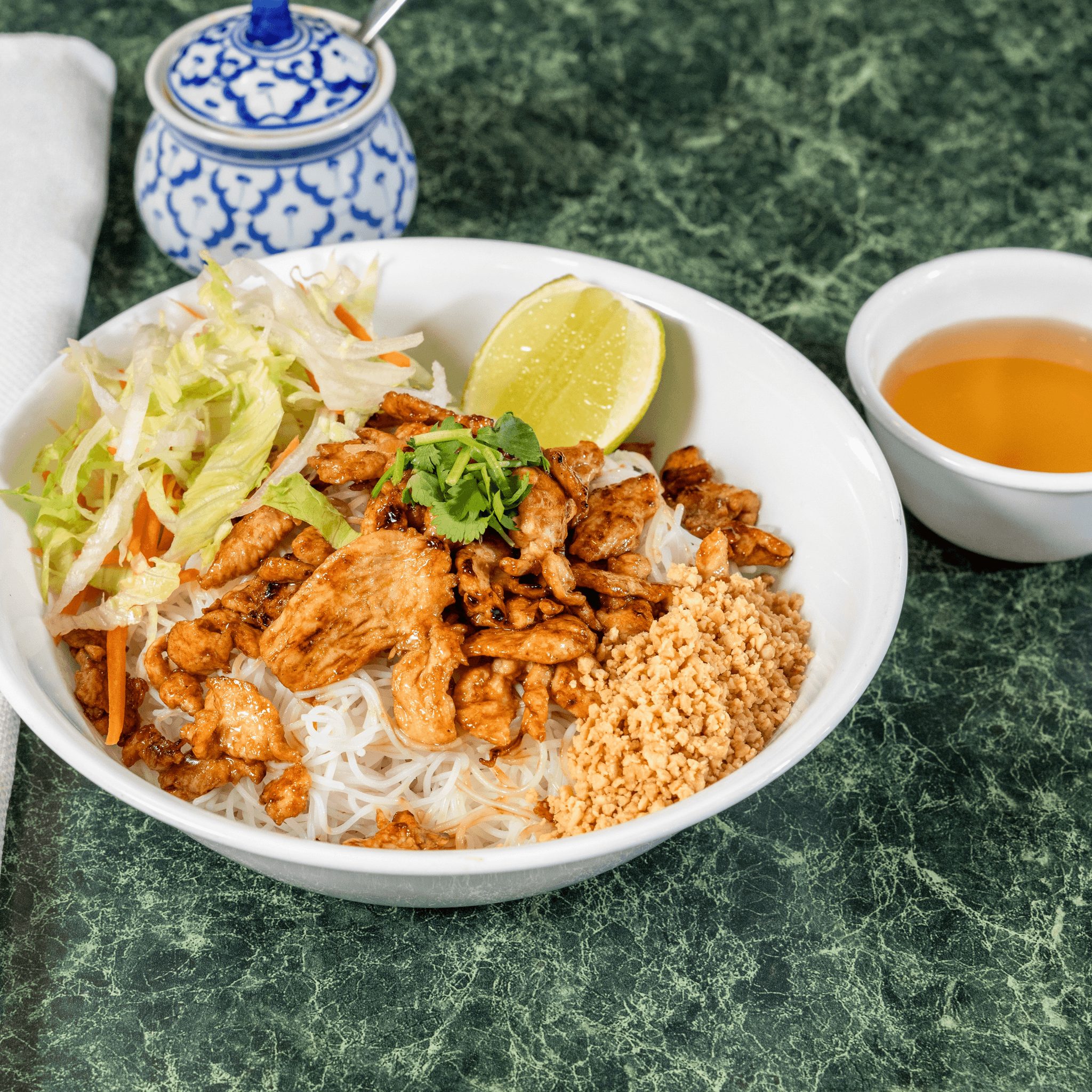 Sauteed Chicken on Vermicelli.