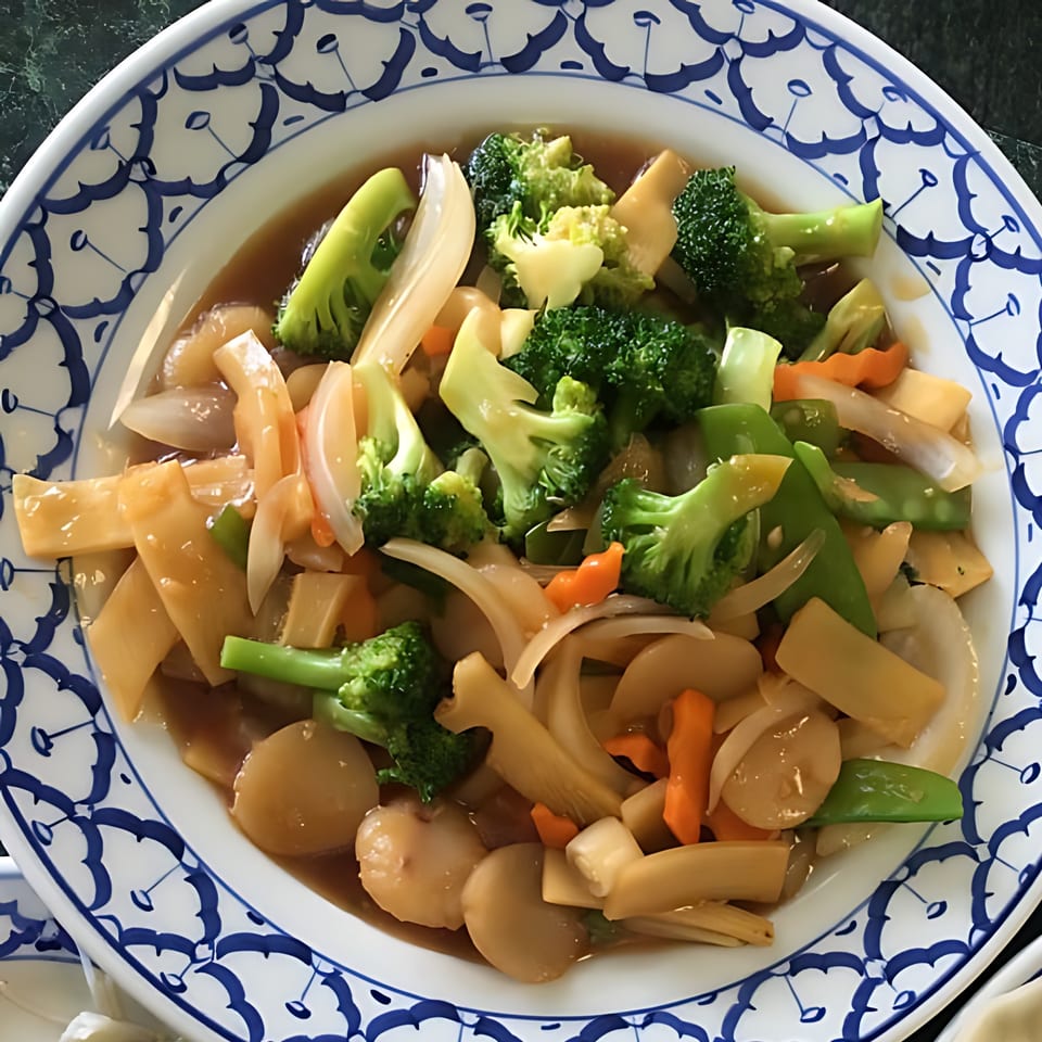 Thai Cafe's stir-fried mixed vegetables with broccoli, bamboo shoots, and water chestnuts in a savory sauce.