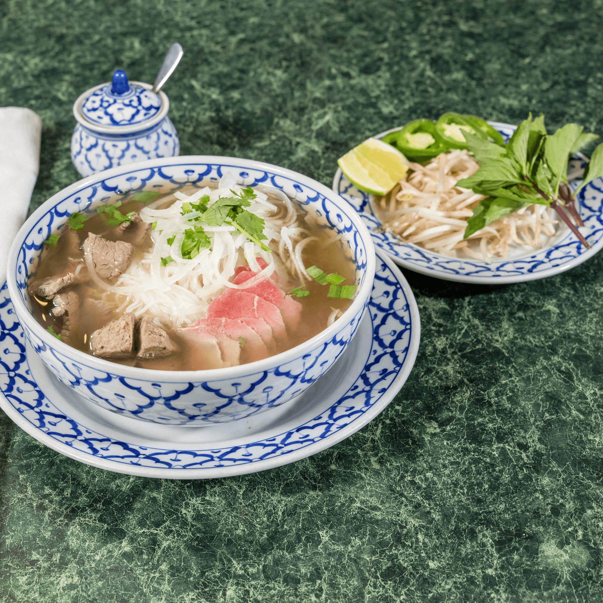 7. Sliced Eye of Round Steak, Well Done Flank, and Meatballs Noodle Soup.